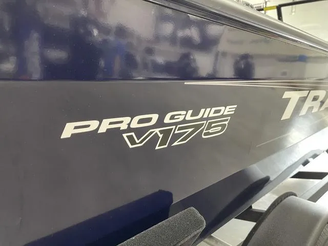 Slide: The Image of 2025 Tracker Pro Guide V-175 Combo boat, close-up of model name on hull. - 4