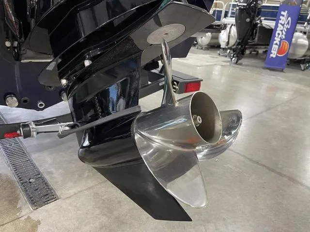 Slide: The Image of 2025 Tracker Pro Guide™ V-175 Combo boat propeller in showroom setting. - 7