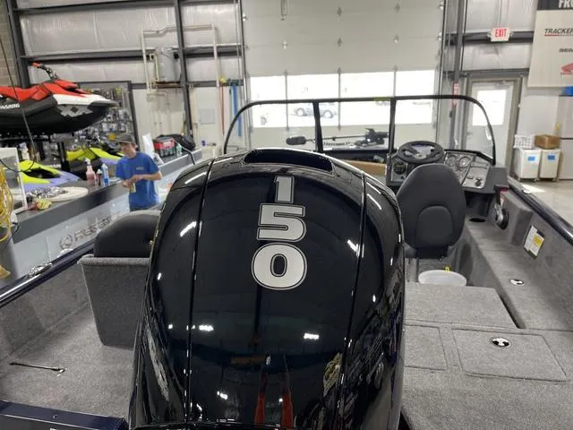 Slide: The Image of 2025 Tracker Pro Guide™ V-175 Combo boat with 150 HP engine in showroom. - 8