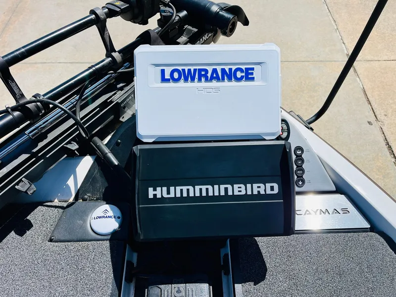 Slide: The Image of 2022 Caymas CX 21 PRO boat dashboard with Lowrance and Humminbird electronics. - 15