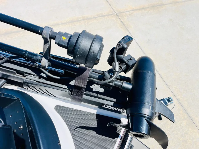 Slide: The Image of Close-up of 2022 Caymas CX 21 PRO boat equipment, featuring Lowrance technology and wiring. - 19