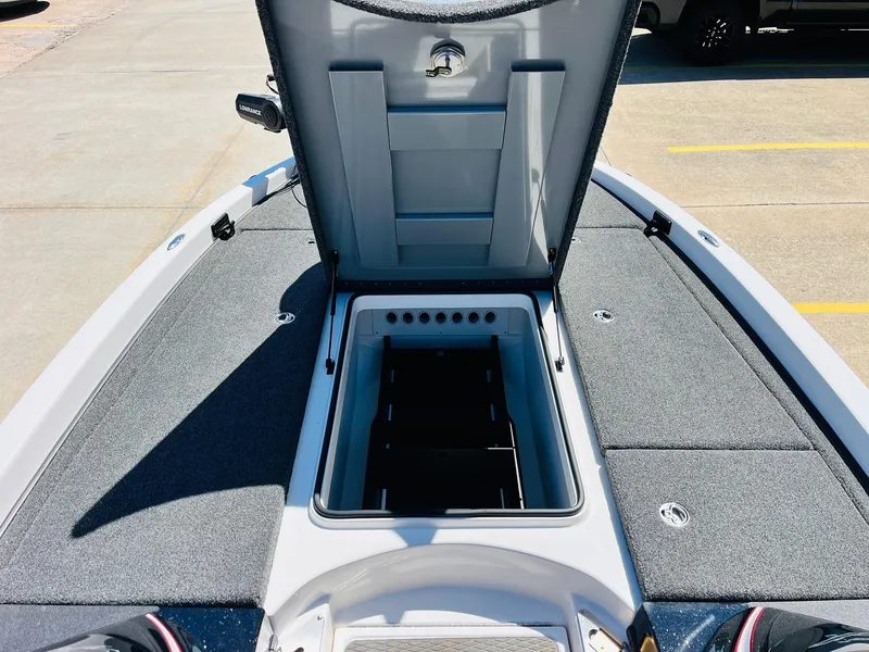 Slide: The Image of 2022 Caymas CX 21 PRO boat with open storage compartment on deck. - 22