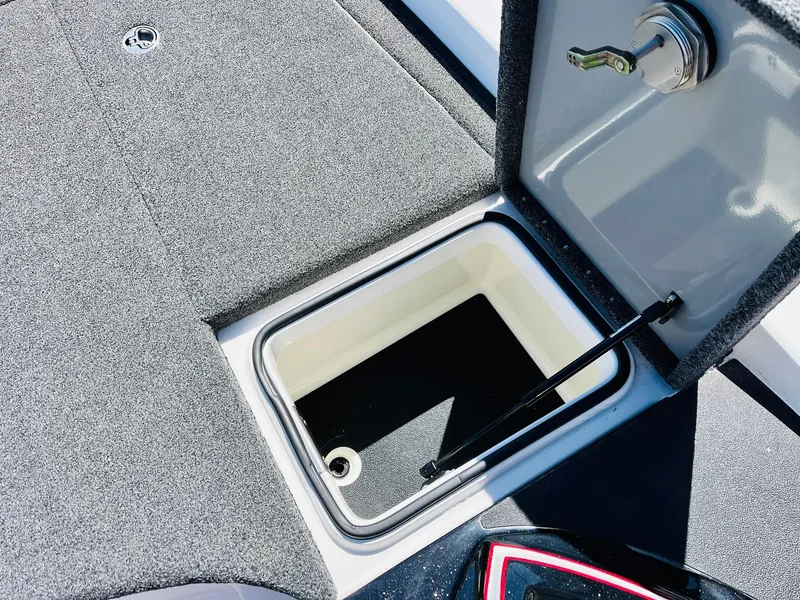 Slide: The Image of Open storage compartment on 2022 Caymas CX 21 PRO boat deck. - 30