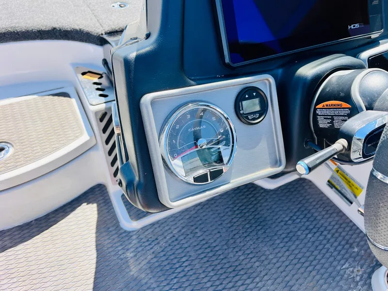 Slide: The Image of Dashboard of 2022 Caymas CX 21 PRO boat with gauges and controls. - 44