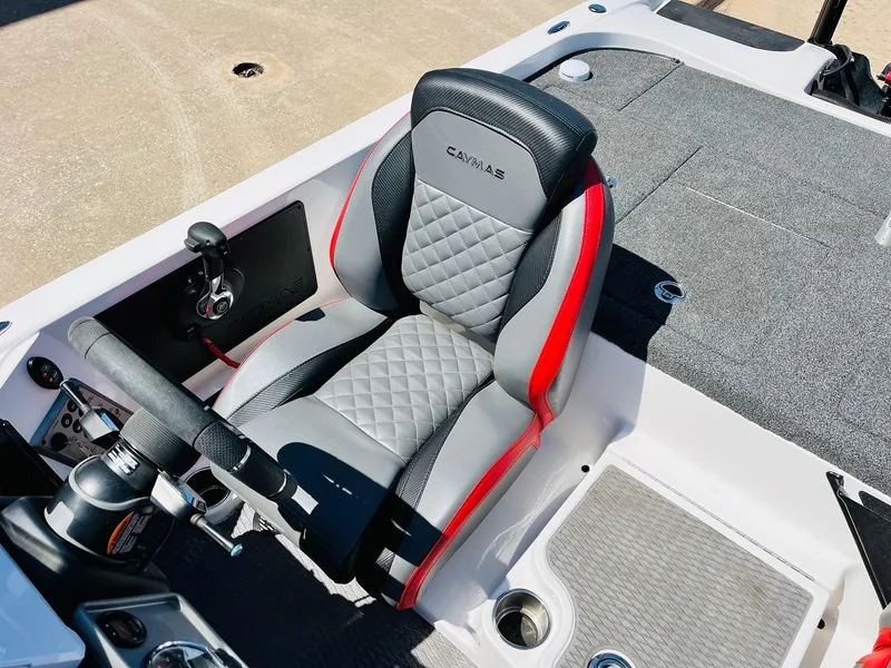 Slide: The Image of 2022 Caymas CX 21 PRO boat seat with quilted design and red accents. - 46