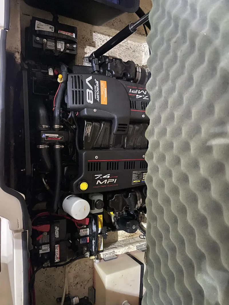 Slide: The Image of Engine compartment of a 2001 Rinker 272 Captiva boat with V8 7.4 MPI engine. - 13