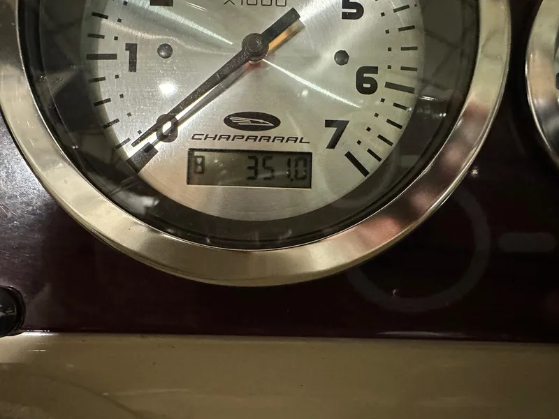 Slide: The Image of Close-up of a 2001 Chaparral Sunesta 263 tachometer displaying 3510 hours. - 19