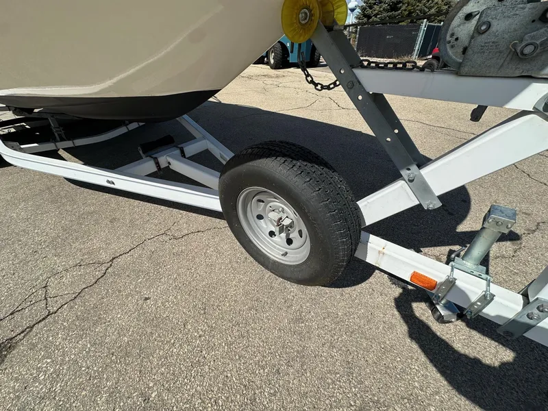 Slide: The Image of Trailer for 2001 Chaparral Sunesta 263 boat on pavement. - 23