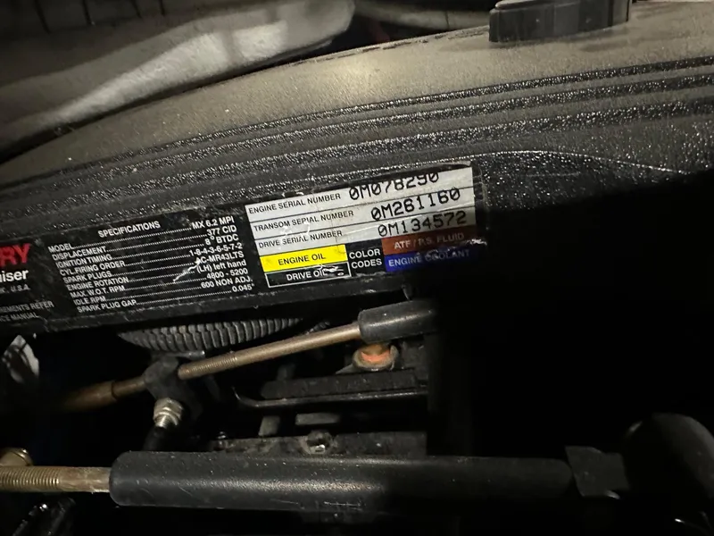 Slide: The Image of Engine compartment of a 2001 Chaparral Sunesta 263 with serial numbers and specifications. - 35