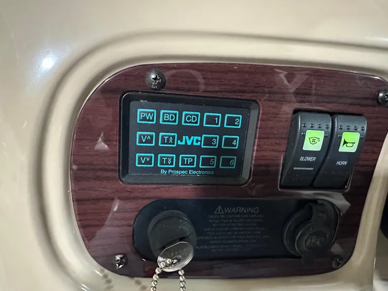 Slide: The Image of Control panel of a 2001 Chaparral Sunesta 263 boat with JVC electronics. - 36