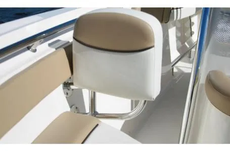 Slide: The Image of 2015 Pioneer Islander 197 boat interior with beige and white seating. - 3