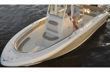Slide: The Image of 2015 Pioneer Islander 197 boat on water, featuring sleek design and spacious deck. - 5