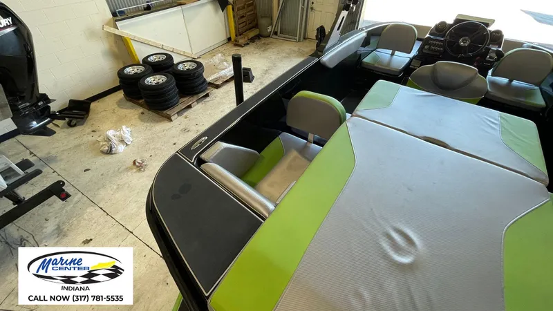 Slide: The Image of 2019 Heyday WT-1 boat interior with green seating, located at Marine Center Indiana. - 11