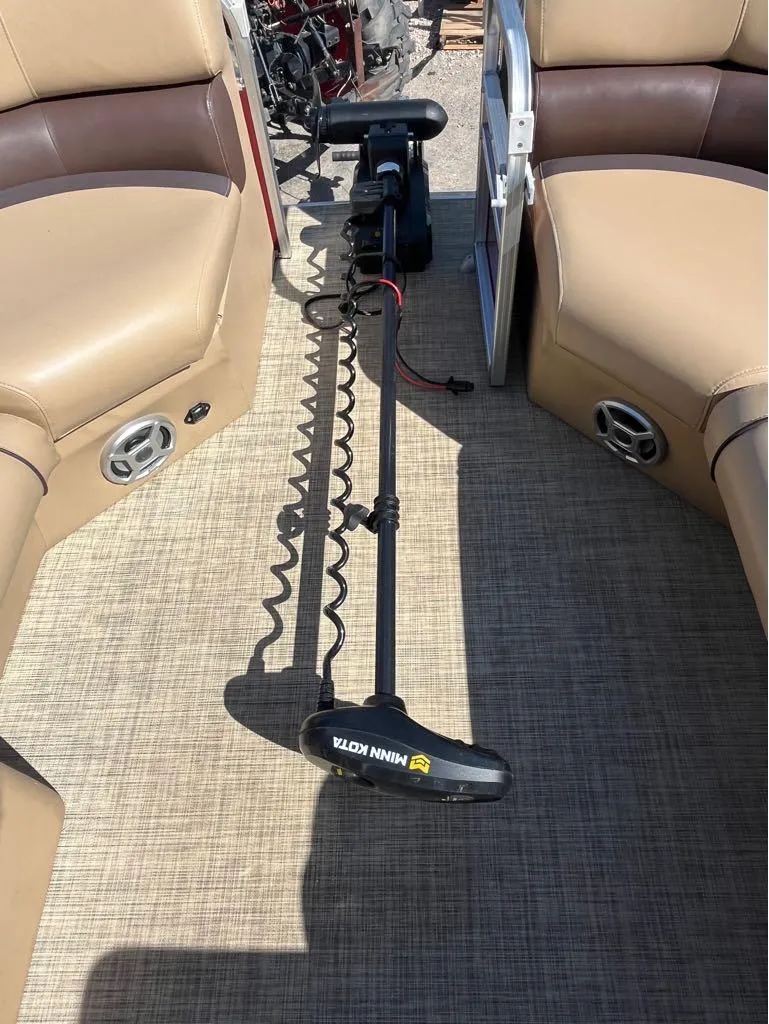 Slide: The Image of 2019 Lowe SS230W boat interior with Minn Kota trolling motor. - 5