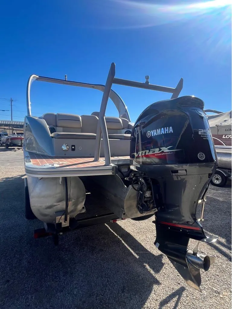 Slide: The Image of 2013 Berkshire 250 Sport BP3 pontoon boat with Yamaha outboard motor, rear view. - 3