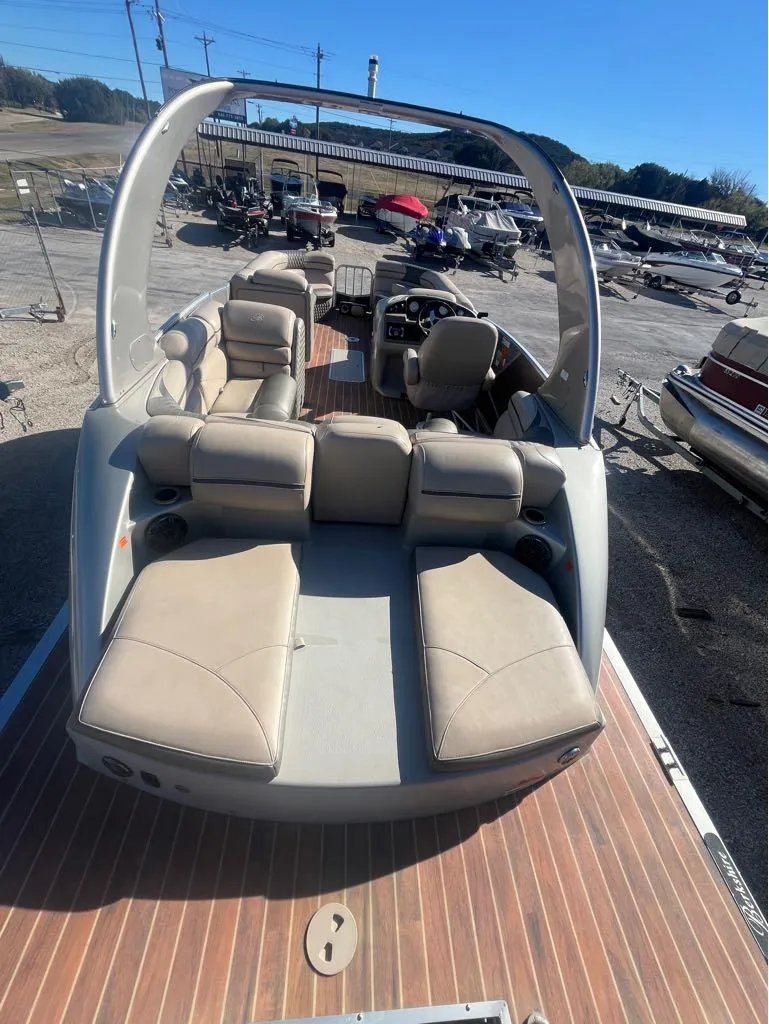 Slide: The Image of 2013 Berkshire 250 Sport BP3 pontoon boat with spacious seating and sleek design. - 5