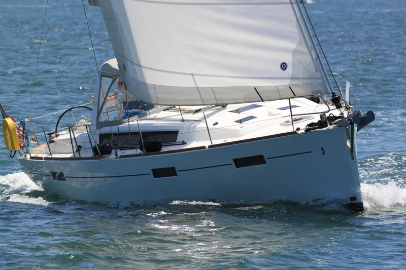 Slide: The Image of 2013 Beneteau Oceanis 41 sailboat navigating on open water. - 1