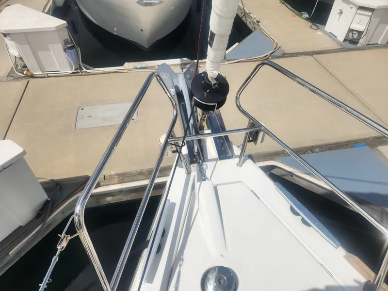 Slide: The Image of Bow of 2013 Beneteau Oceanis 41 sailboat docked at marina. - 14