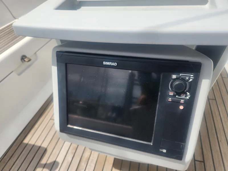 Slide: The Image of Simrad navigation system on 2013 Beneteau Oceanis 41 yacht, featuring a sleek design. - 16