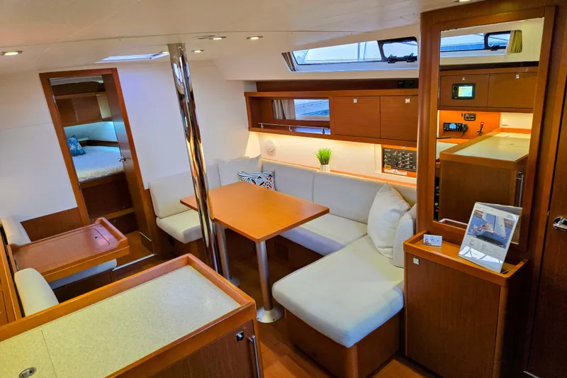 Slide: The Image of Luxurious interior of 2013 Beneteau Oceanis 41 yacht with modern seating and wood finishes. - 24
