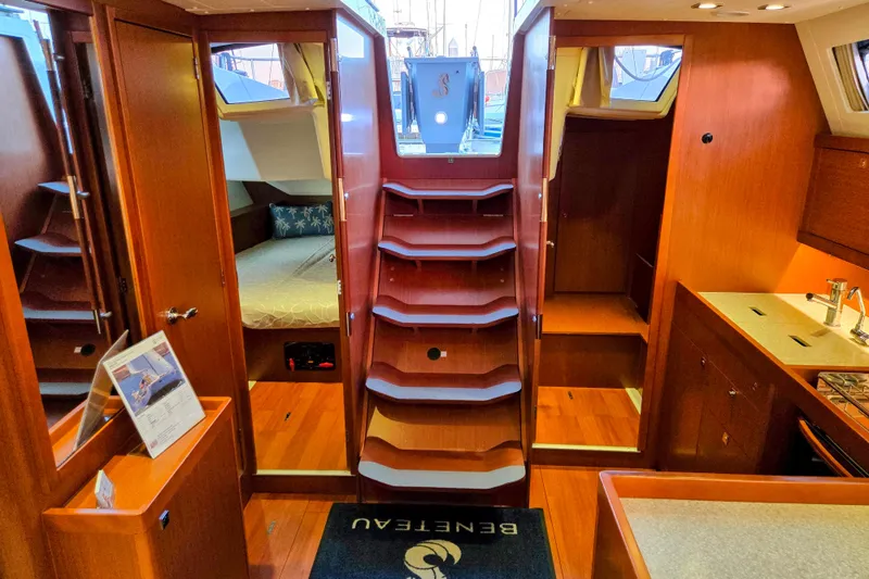 Slide: The Image of Interior of 2013 Beneteau Oceanis 41 sailboat with wooden finish and cozy cabin. - 31