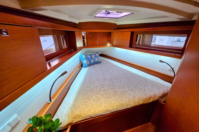 Slide: The Image of Cozy cabin interior of 2013 Beneteau Oceanis 41 yacht with elegant wood finish. - 34