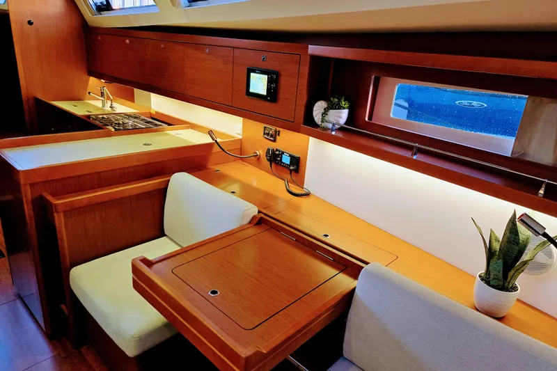 Slide: The Image of Interior of 2013 Beneteau Oceanis 41 yacht with wooden furnishings and modern amenities. - 37