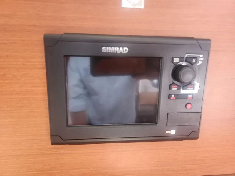 Slide: The Image of Simrad navigation system on 2013 Beneteau Oceanis 41 yacht dashboard. - 45