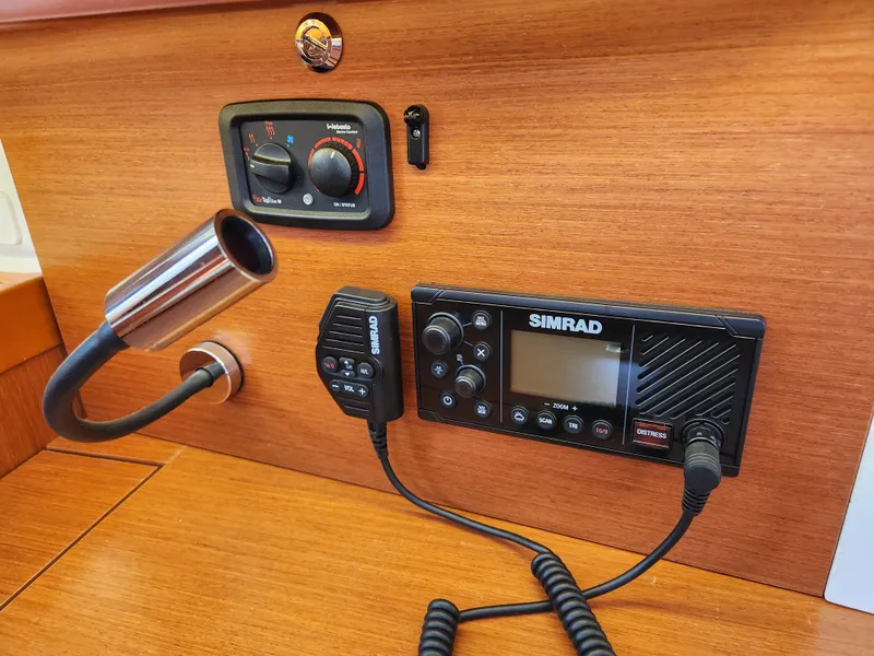 Slide: The Image of Control panel of a 2013 Beneteau Oceanis 41 with Simrad radio equipment. - 46