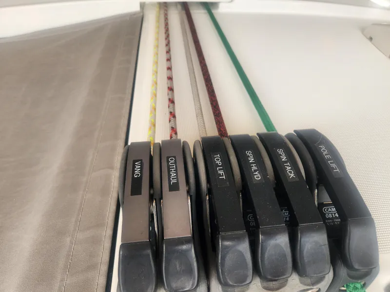 Slide: The Image of Sailing controls on a 2013 Beneteau Oceanis 41, featuring vang, outhaul, and more. - 9