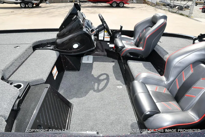 Slide: The Image of 2018 Nitro Z18 Pro boat interior with sleek black and red seating. - 13