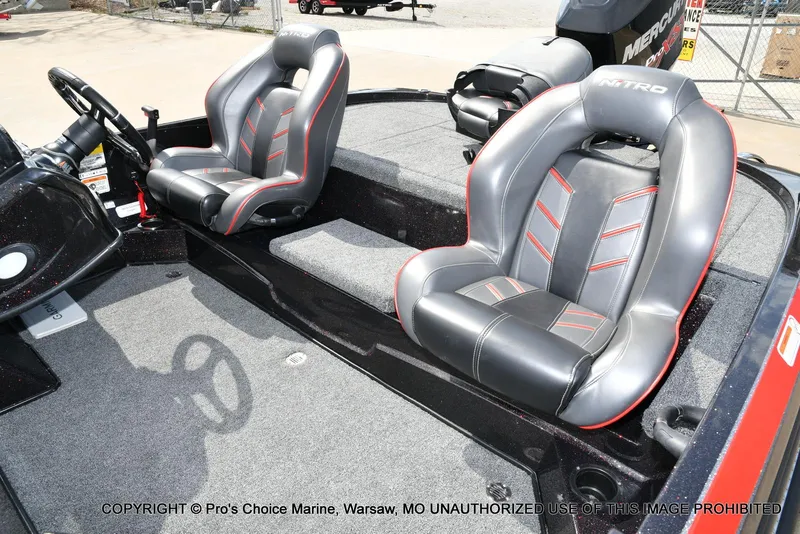 Slide: The Image of 2018 Nitro Z18 Pro boat interior with dual seats and steering wheel. - 14