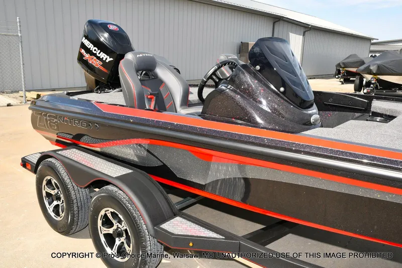 Slide: The Image of 2018 Nitro Z18 Pro boat with Mercury 175 Pro-XS engine, sleek black and red design. - 15