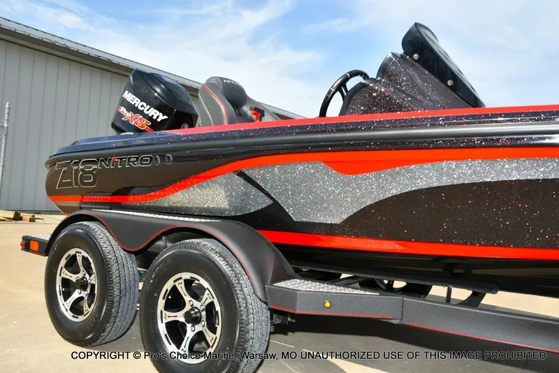 Slide: The Image of 2018 Nitro Z18 Pro boat with Mercury 175 Pro-XS engine, parked on a trailer. - 17