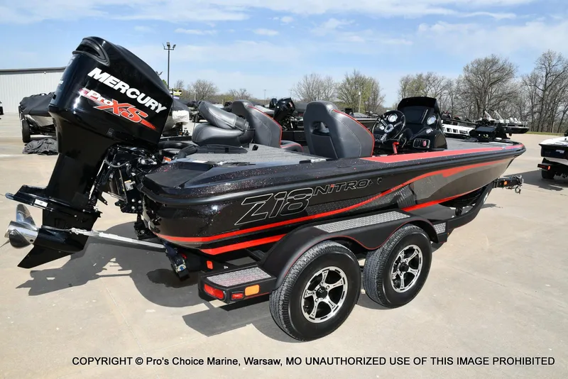 Slide: The Image of 2018 Nitro Z18 Pro boat with Mercury 175 Pro-XS engine, parked outdoors. - 19