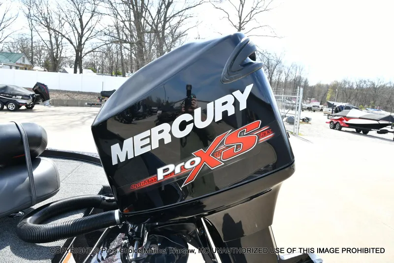 Slide: The Image of 2018 Nitro Z18 Pro boat with Mercury Pro XS engine in outdoor setting. - 23