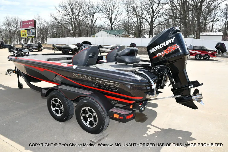 Slide: The Image of 2018 Nitro Z18 Pro boat with Mercury 175 Pro-XS engine, parked outdoors. - 26