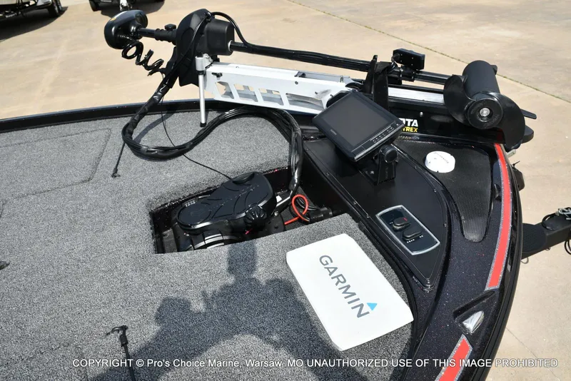 Slide: The Image of 2018 Nitro Z18 Pro boat dashboard with Garmin electronics and Minn Kota trolling motor. - 4