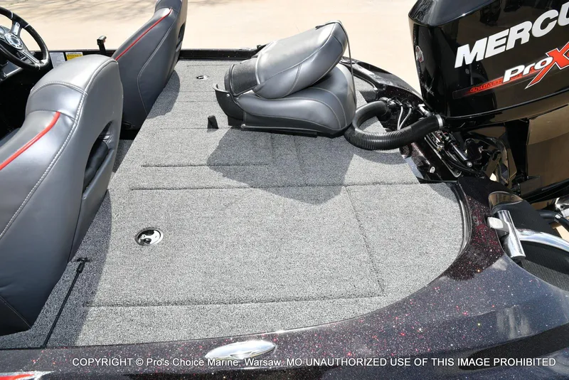 Slide: The Image of 2018 Nitro Z18 Pro boat interior with Mercury Pro XS engine, featuring gray seating and carpeted deck. - 41