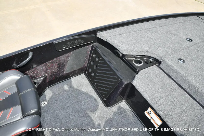 Slide: The Image of 2018 Nitro Z18 Pro boat interior with carpeted deck and seating. - 48