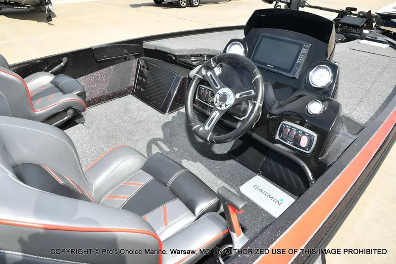 Slide: The Image of Interior of a 2018 Nitro Z18 Pro boat with Garmin navigation system and sleek seating. - 6