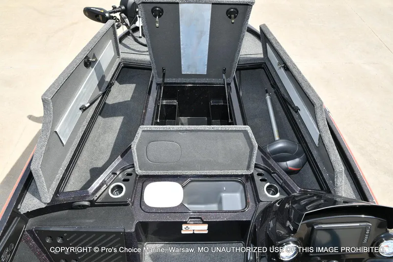 Slide: The Image of 2018 Nitro Z18 Pro boat interior with open storage compartments and equipment. - 9