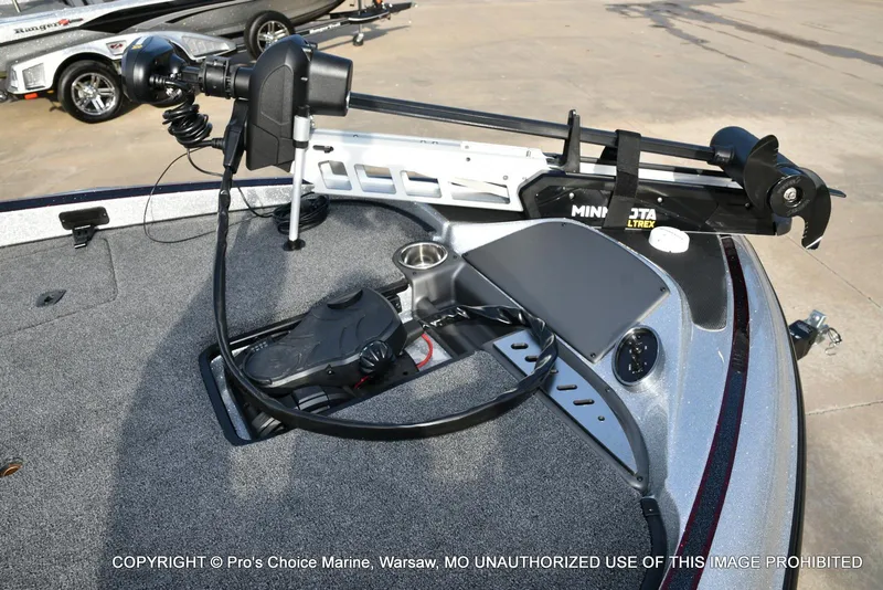 Slide: The Image of 2024 Triton 18 TRX boat deck with Minn Kota Ultrex trolling motor. - 3