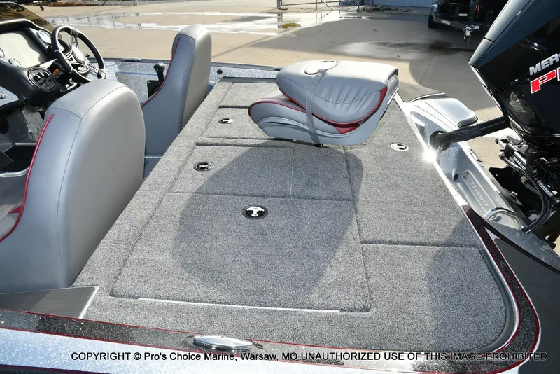 Slide: The Image of 2024 Triton 18 TRX boat interior with seating and storage compartments. - 30