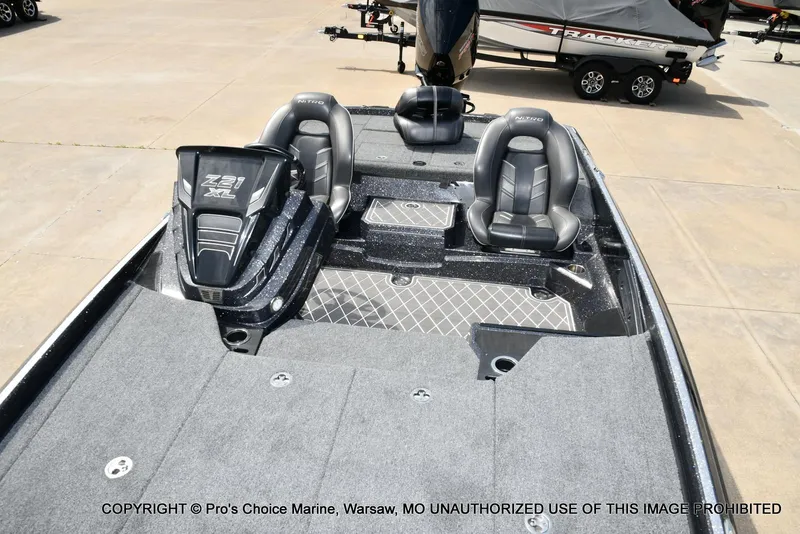 Slide: The Image of 2022 Nitro Z21 XL Pro boat with dual seats and spacious deck. - 10
