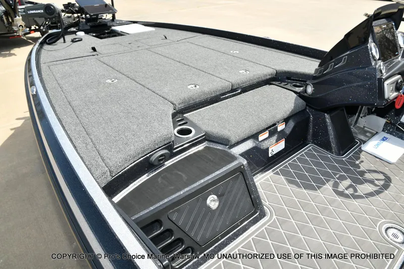 Slide: The Image of 2022 Nitro Z21 XL Pro boat deck with storage compartments and control console. - 11