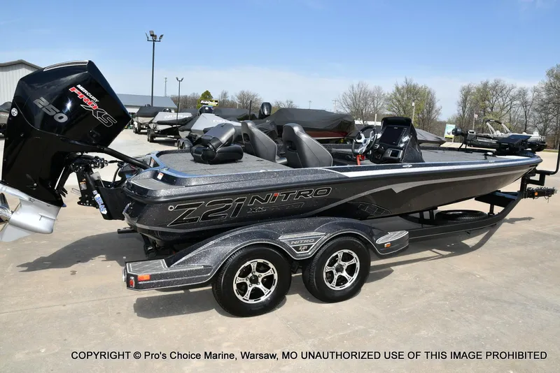 Slide: The Image of 2022 Nitro Z21 XL Pro boat with Mercury 250 Pro XS engine on trailer. - 17