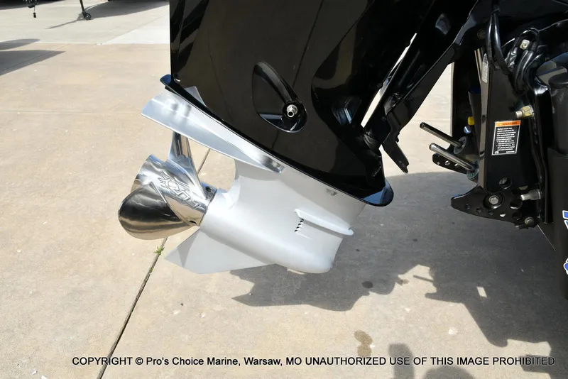 Slide: The Image of 2022 Nitro Z21 XL Pro boat motor and propeller detail on concrete surface. - 21