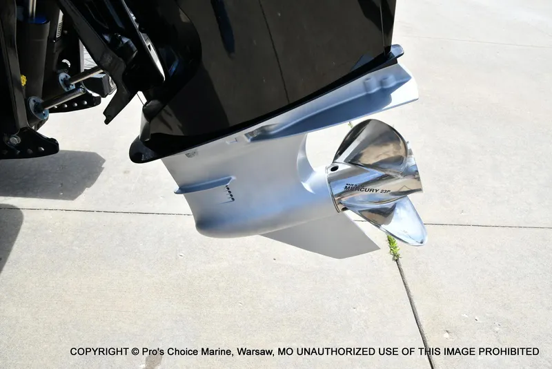 Slide: The Image of 2022 Nitro Z21 XL Pro boat with Mercury 23P propeller on concrete surface. - 24