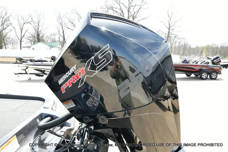 Slide: The Image of Mercury Pro XS 250 engine on 2022 Nitro Z21 XL Pro boat, outdoor setting. - 25